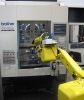 Robot Fanuc vymuje kusy ve vysokorychlostnm obrbcm centru Brother TC-R2B